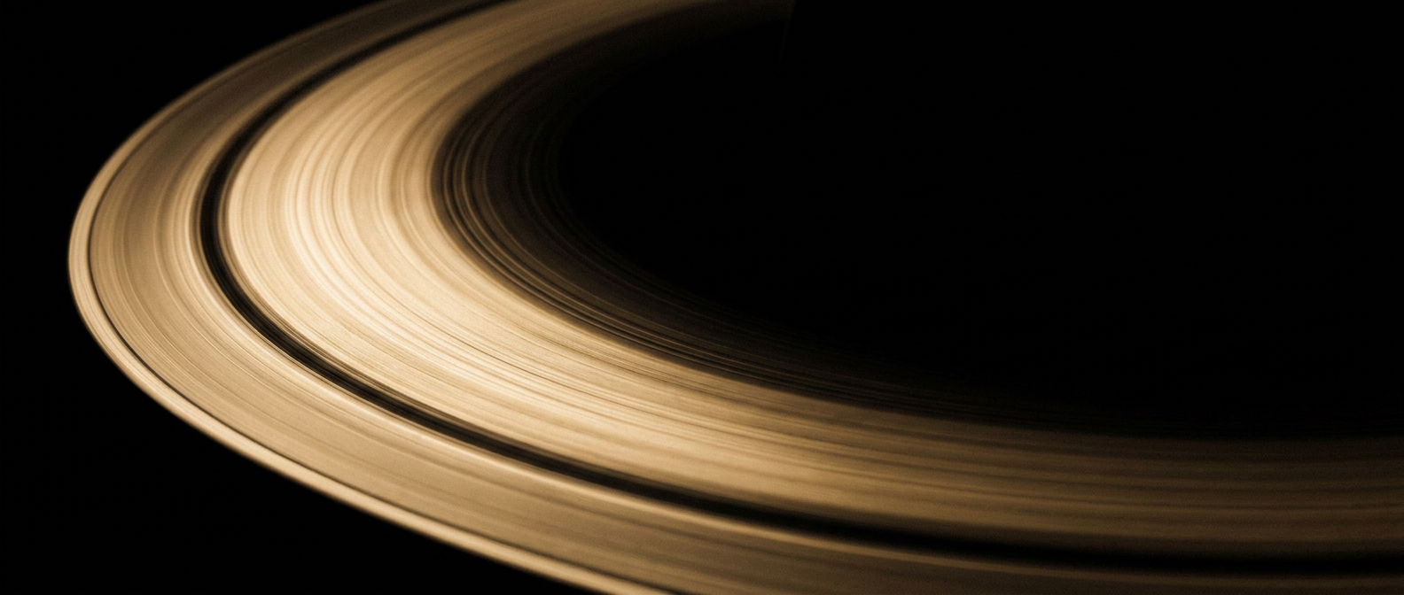 Abstract champagne arc against onyx — a visual metaphor for legacy and what comes next